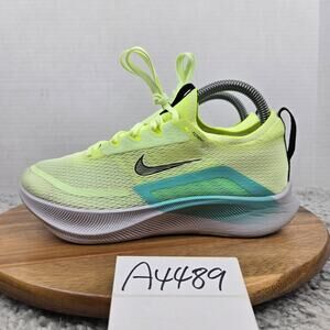 Nike Womens 7.5 Zoom Fly 4 Barely Volt Dynamic Turquoise Fast Pack Running Shoe
